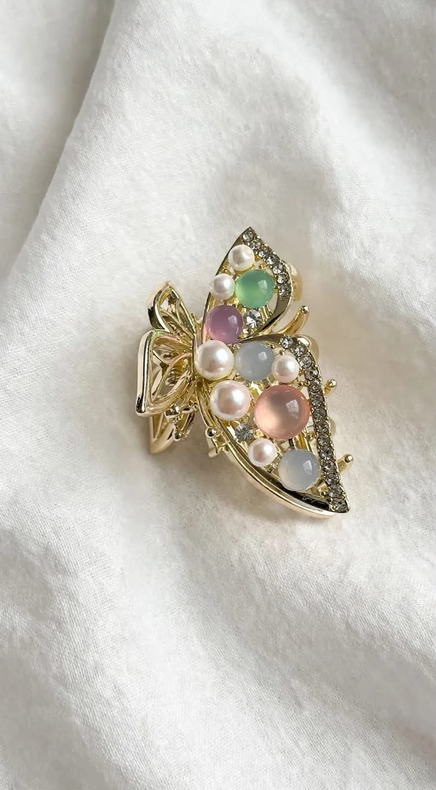 Butterfly clutcher